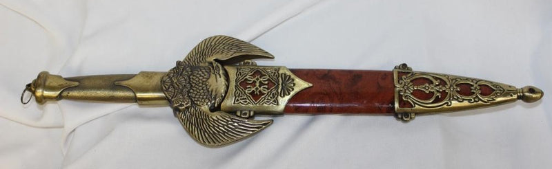 A photo of an elaborate dagger and sheathe, which looks as though it was created for use in a fantasy setting