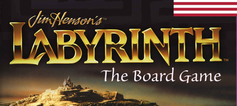 A photo of the Title from Labyrinth the Board Game, as read on the box. The words Jim Henson's Labyrinth The Board Game are superimposed in stylized font in front of what appears to be a large maze. 