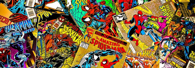 A photo of a pile of comic books, mostly Marvel publications, with Spiderman being easily recognizable on top of the pile