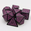 Purple polyhedral dice set on a white background