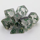 Set of clear dice with green numbers on a white background